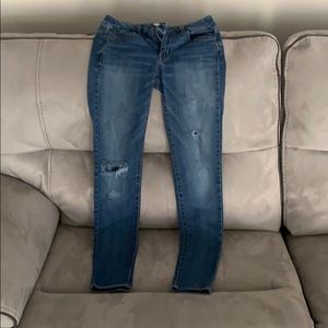 American Eagle Super stretch ripped jeans.